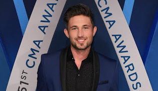 WATCH NOW: Michael Ray’s puppy made his Disney dreams come true — and helped thousands of other dogs, too